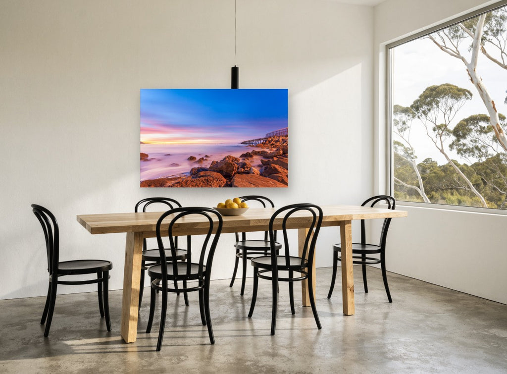 Dusk Over Rocky Shore coastal canvas print on the wall of a dining room