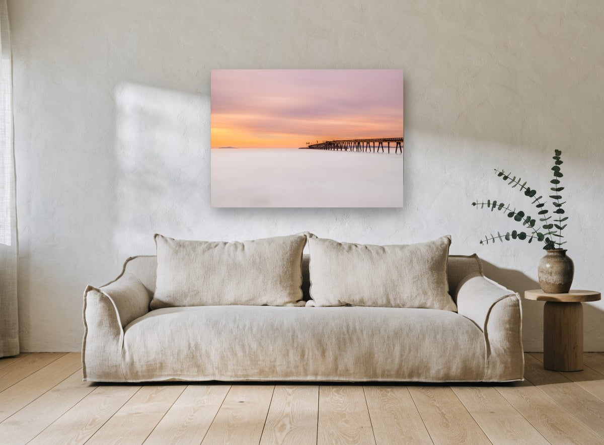 Soft Dusk Pier coastal canvas print on the wall of a living room