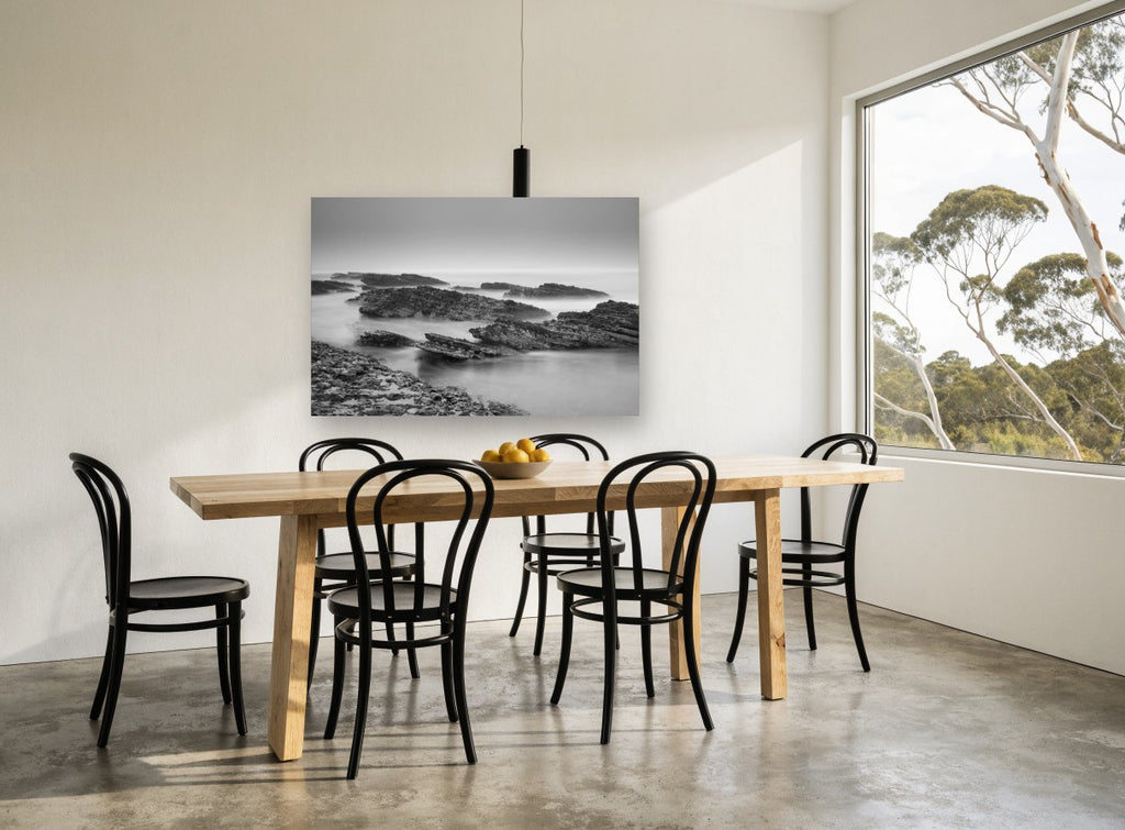 Misty Rock Shelves coastal canvas print on the wall of a dining room