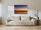 Crescent Moon Dusk coastal canvas print on the wall of a living room