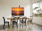 Amber Pebble Shore coastal canvas print on the wall of a dining room