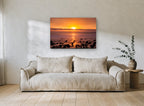 Amber Pebble Shore coastal canvas print on the wall of a living room