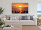 Amber Pebble Shore coastal canvas print on the wall of a beach house living room