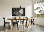 Pale Wing Rest animal canvas print on the wall of a dining room