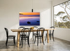 Dusk Reflections coastal canvas print on the wall of a dining room
