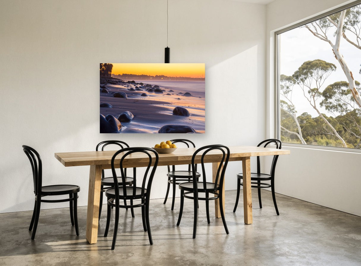 Dusk Boulders Shoreline coastal canvas print on the wall of a dining room