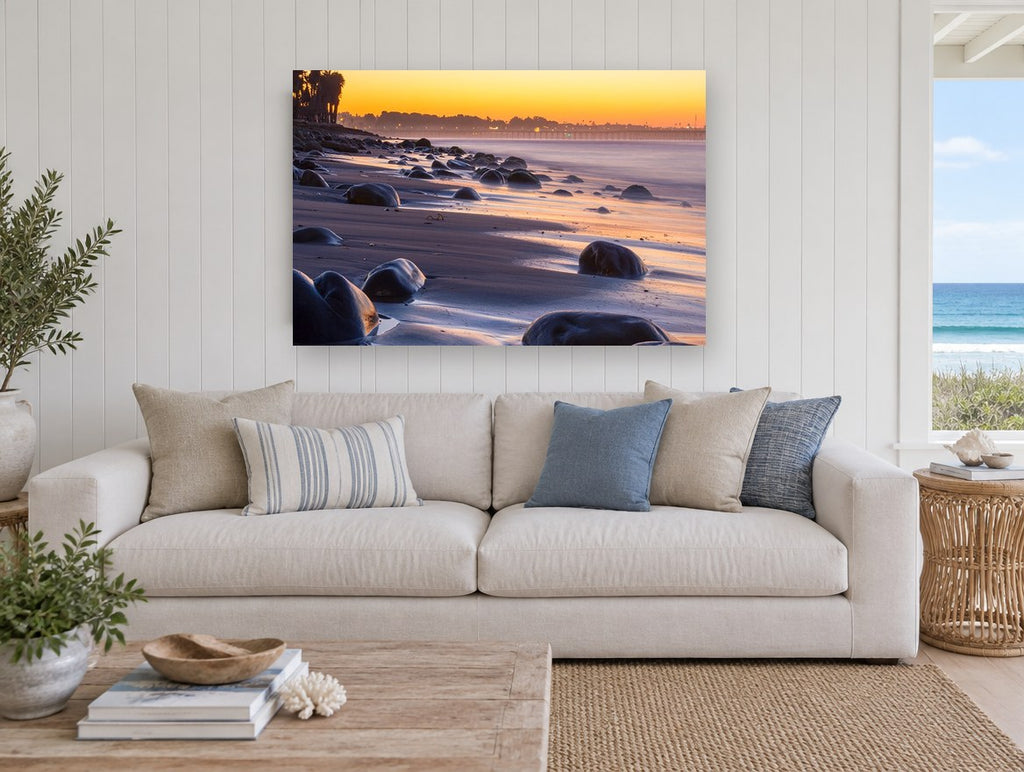 Dusk Boulders Shoreline coastal canvas print on the wall of a beach house living room