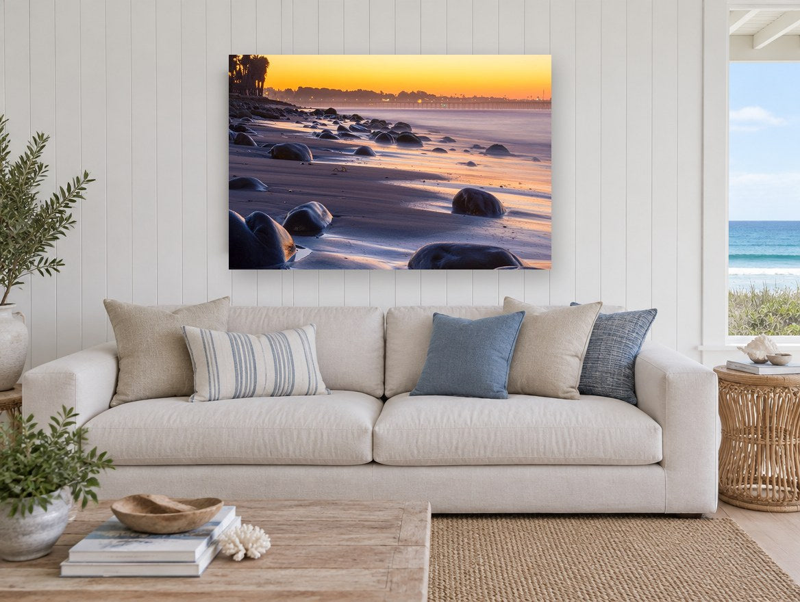 Dusk Boulders Shoreline coastal canvas print on the wall of a beach house living room