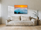 Sunset Wave Burst coastal canvas print on the wall of a living room