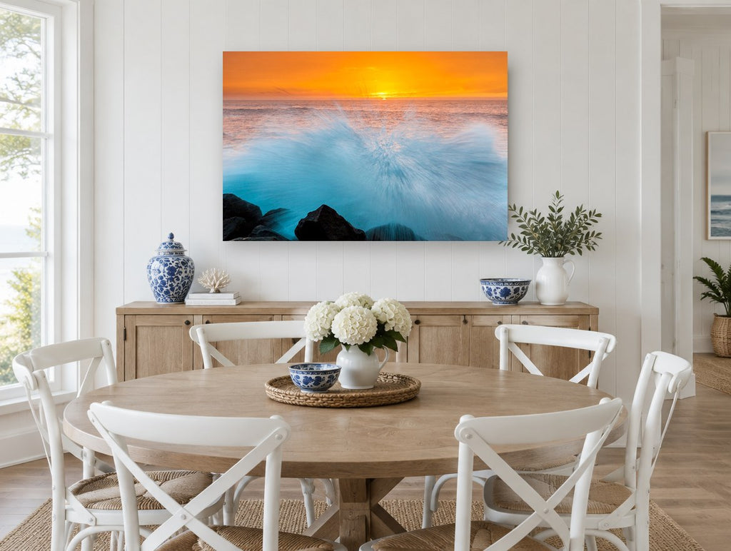 Sunset Wave Burst coastal canvas print on the wall of a Hamptons dining room