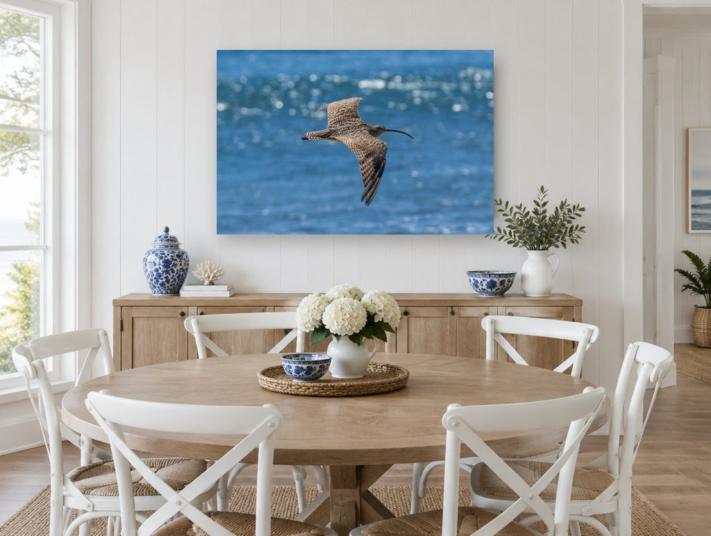 Curlew Over Blue Water animal canvas print on the wall of a Hamptons dining room