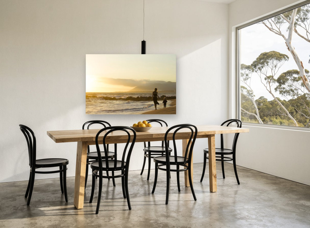 Golden Hour Shoreline Stroll coastal canvas print on the wall of a dining room