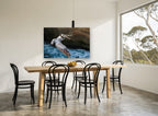 Pelican Over Surf coastal canvas print on the wall of a dining room