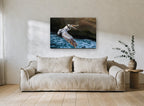 Pelican Over Surf coastal canvas print on the wall of a living room