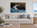 Pelican Over Surf coastal canvas print on the wall of a beach house living room