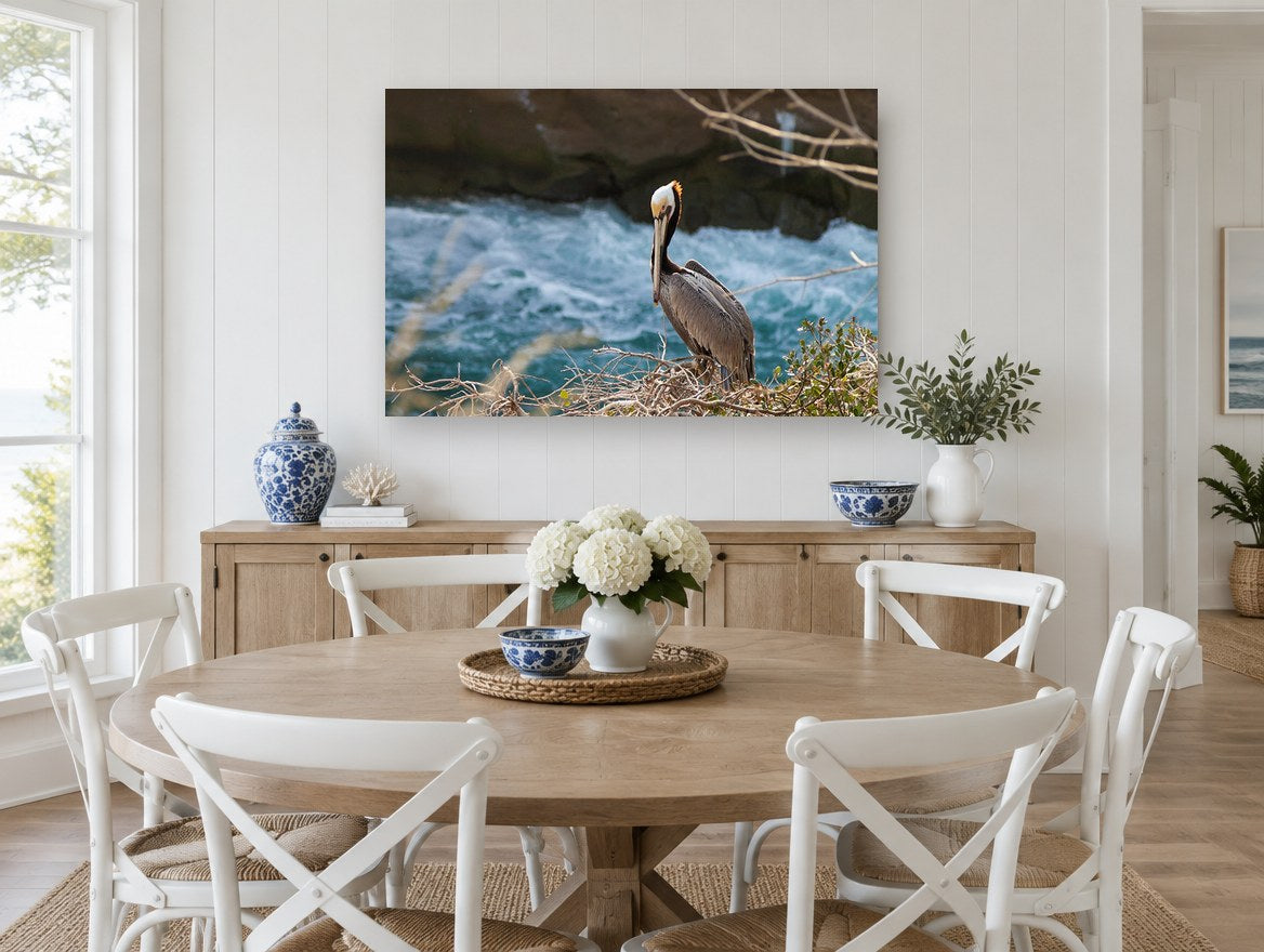 Pelican on the Ledge coastal canvas print on the wall of a Hamptons dining room