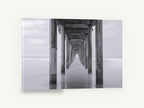 Silent Pier Corridor, pier pilings black and white photograph, coastal canvas wall art print ready to hang