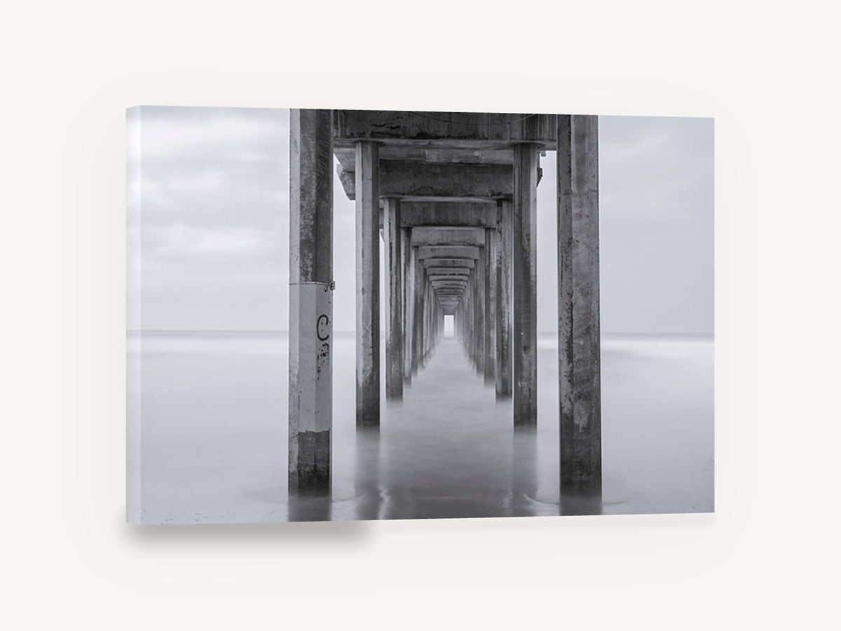 Silent Pier Corridor, pier pilings black and white photograph, coastal canvas wall art print ready to hang