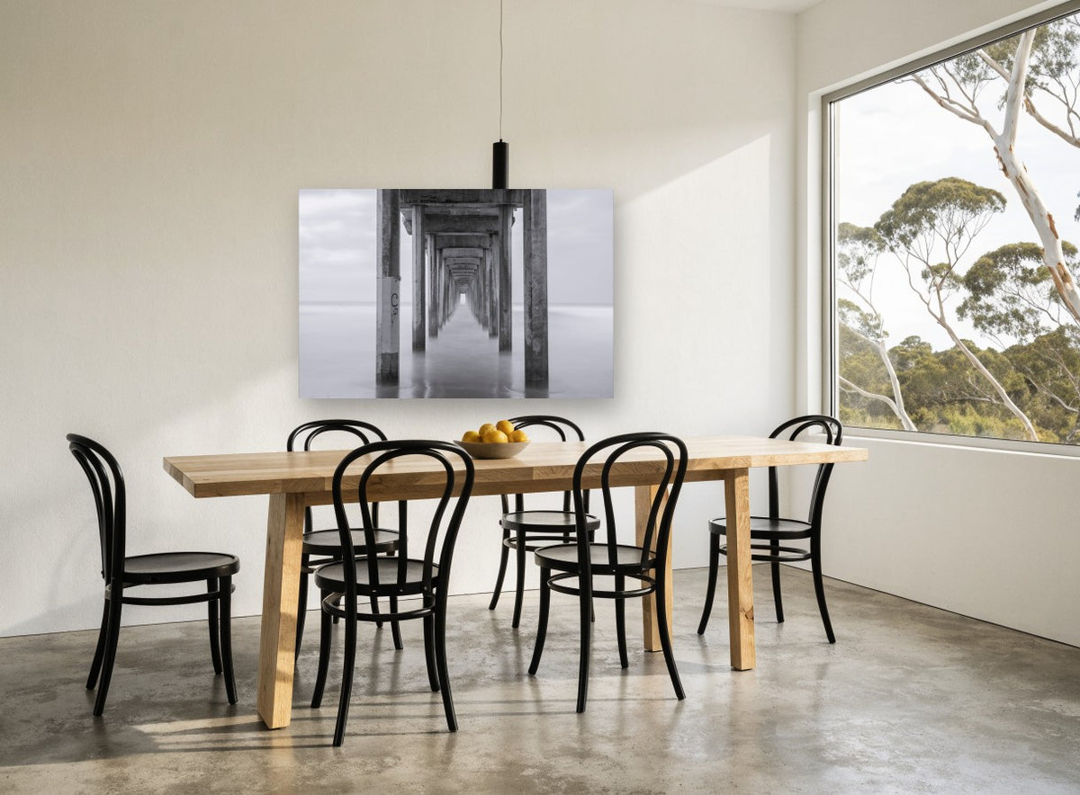 Silent Pier Corridor coastal canvas print on the wall of a dining room