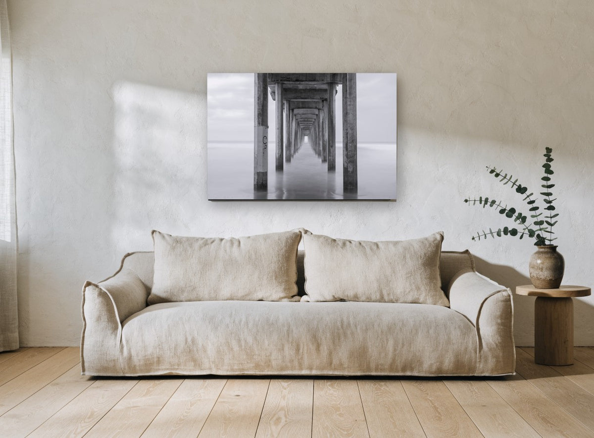 Silent Pier Corridor coastal canvas print on the wall of a living room