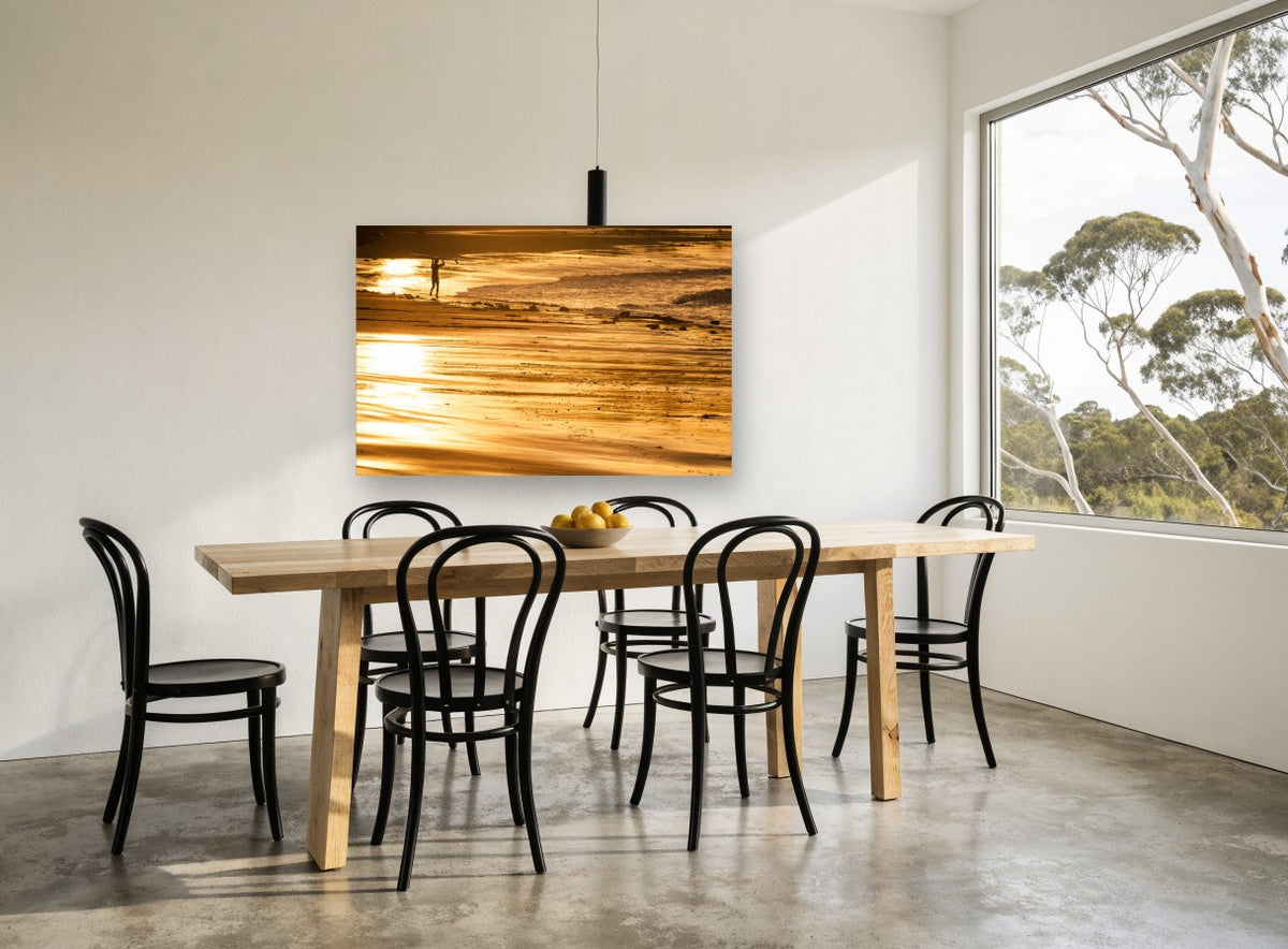 Golden Hour Surfer coastal canvas print on the wall of a dining room