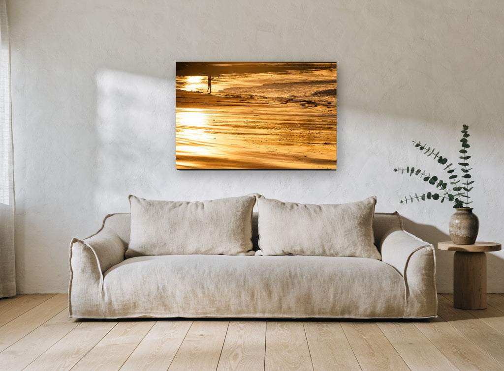 Golden Hour Surfer coastal canvas print on the wall of a living room