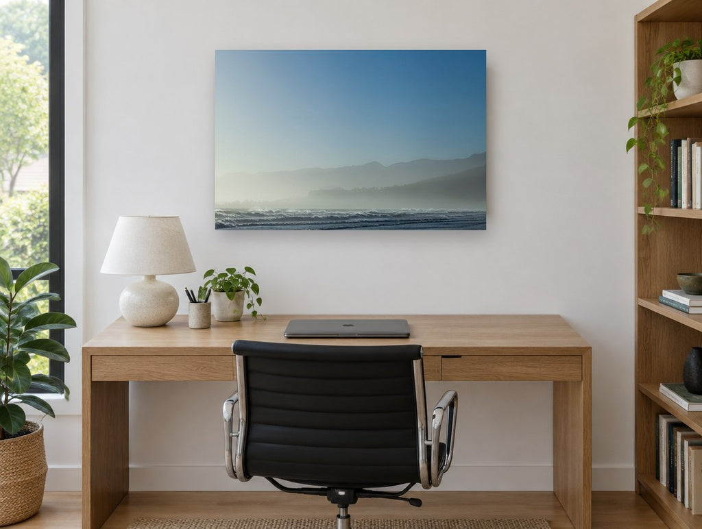 Blue Misty Shoreline coastal canvas print on the wall of a study