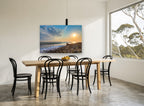 Pebble Shore Sunset coastal canvas print on the wall of a dining room