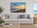 Pebble Shore Sunset coastal canvas print on the wall of a beach house living room