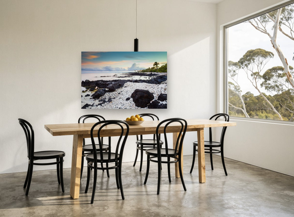 Coral Shore Dawn coastal canvas print on the wall of a dining room