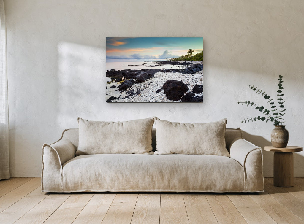 Coral Shore Dawn coastal canvas print on the wall of a living room
