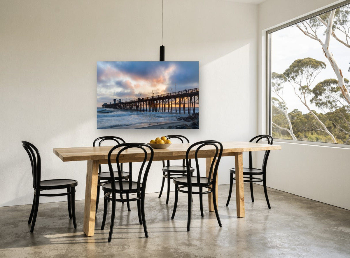 Pier at Dusk Drama coastal canvas print on the wall of a dining room