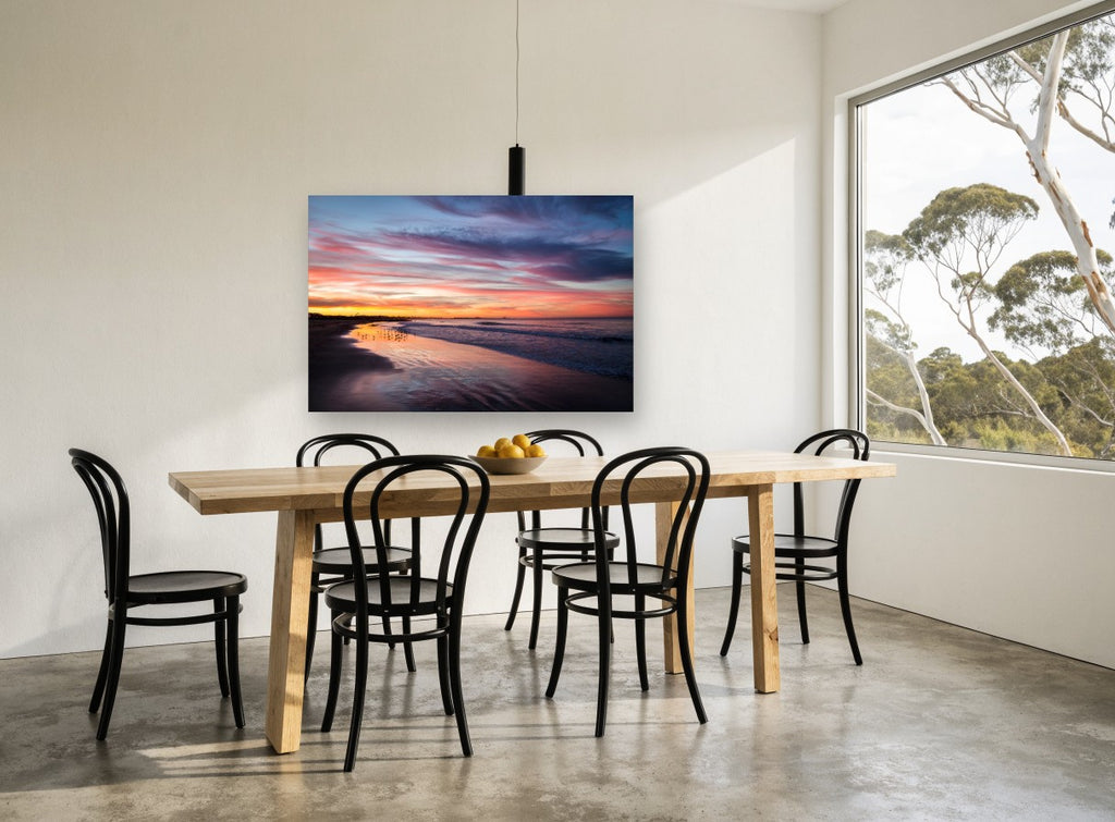 Dusk Shorebirds Glow coastal canvas print on the wall of a dining room