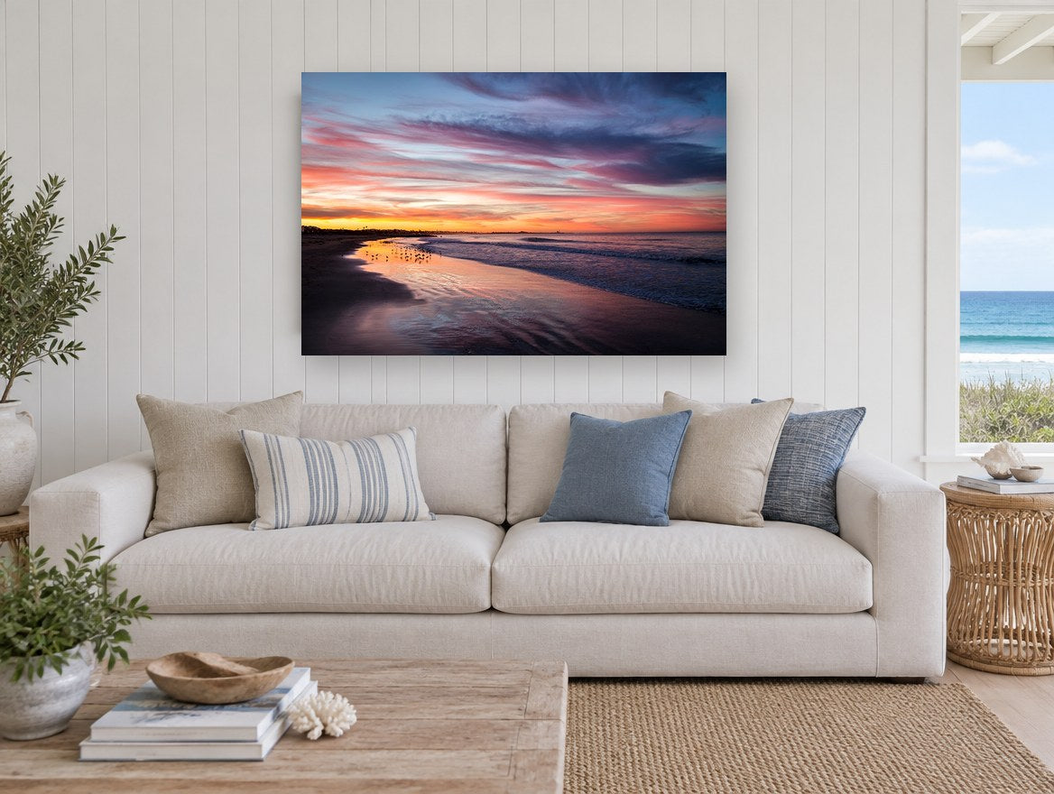 Dusk Shorebirds Glow coastal canvas print on the wall of a beach house living room