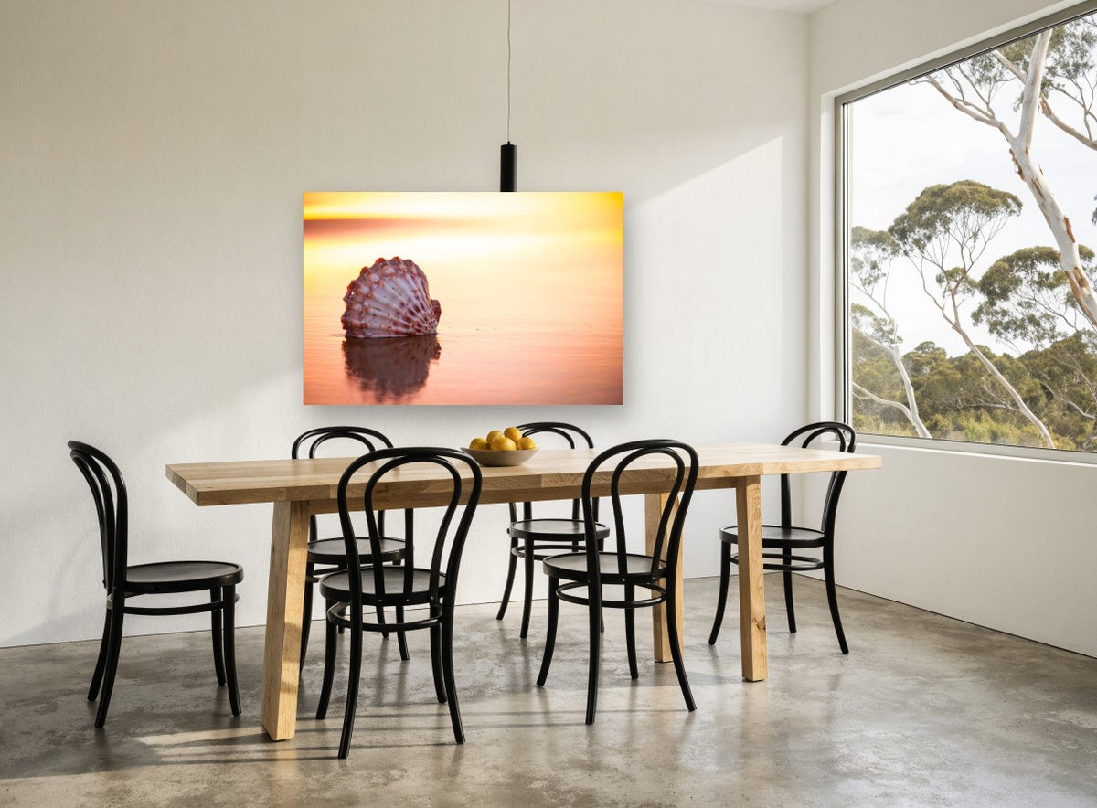 Scallop Shell at Sunrise coastal canvas print on the wall of a dining room