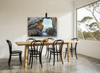 Window to the Sea coastal canvas print on the wall of a dining room