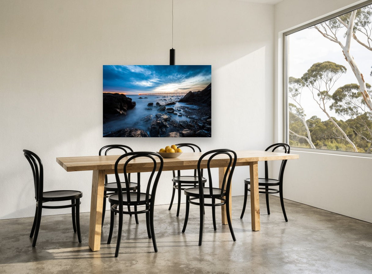 Pier Lights at Dusk coastal canvas print on the wall of a dining room