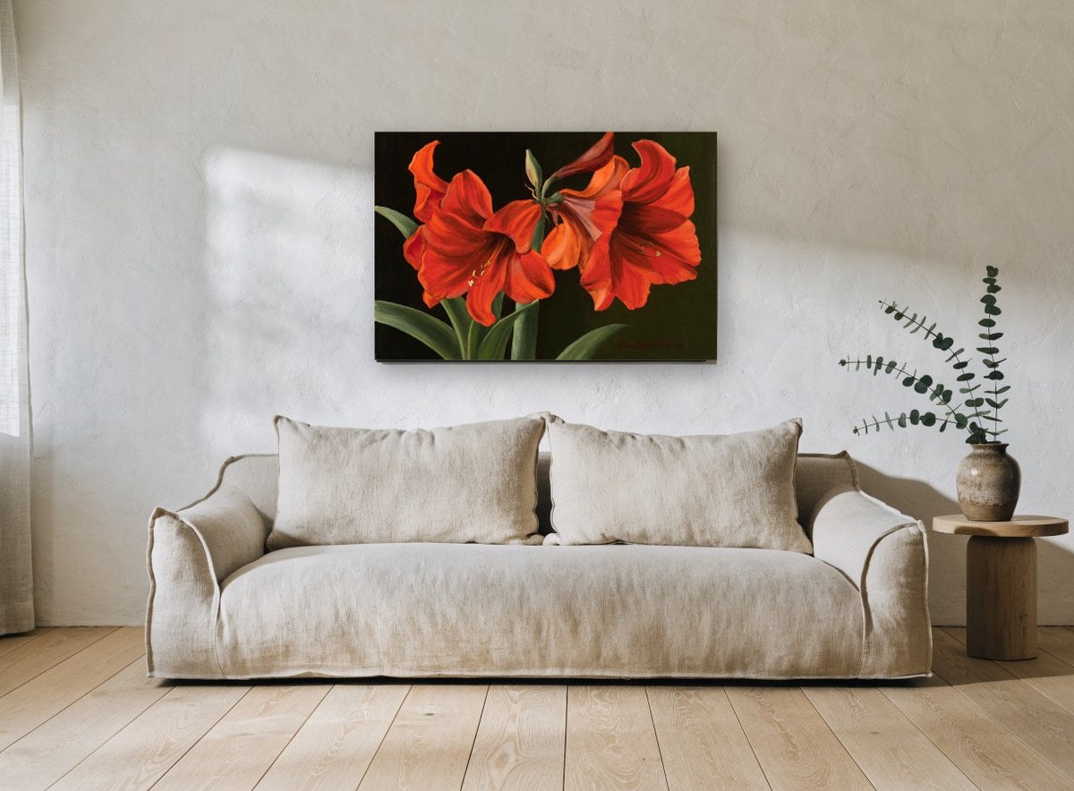 Scarlet Amaryllis Pair floral canvas print on the wall of a living room