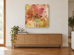 Autumn Harvest Leaves floral canvas print on the wall of a living room above a sideboard