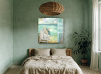 Hat on the Beach Chair coastal canvas print on the wall of a bedroom