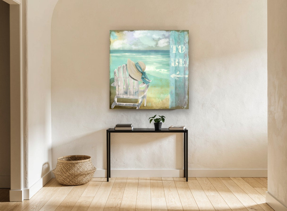 Hat on the Beach Chair coastal canvas print on the wall of a hallway