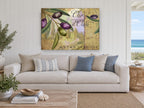 Tuscan Olive Label floral canvas print on the wall of a beach house living room