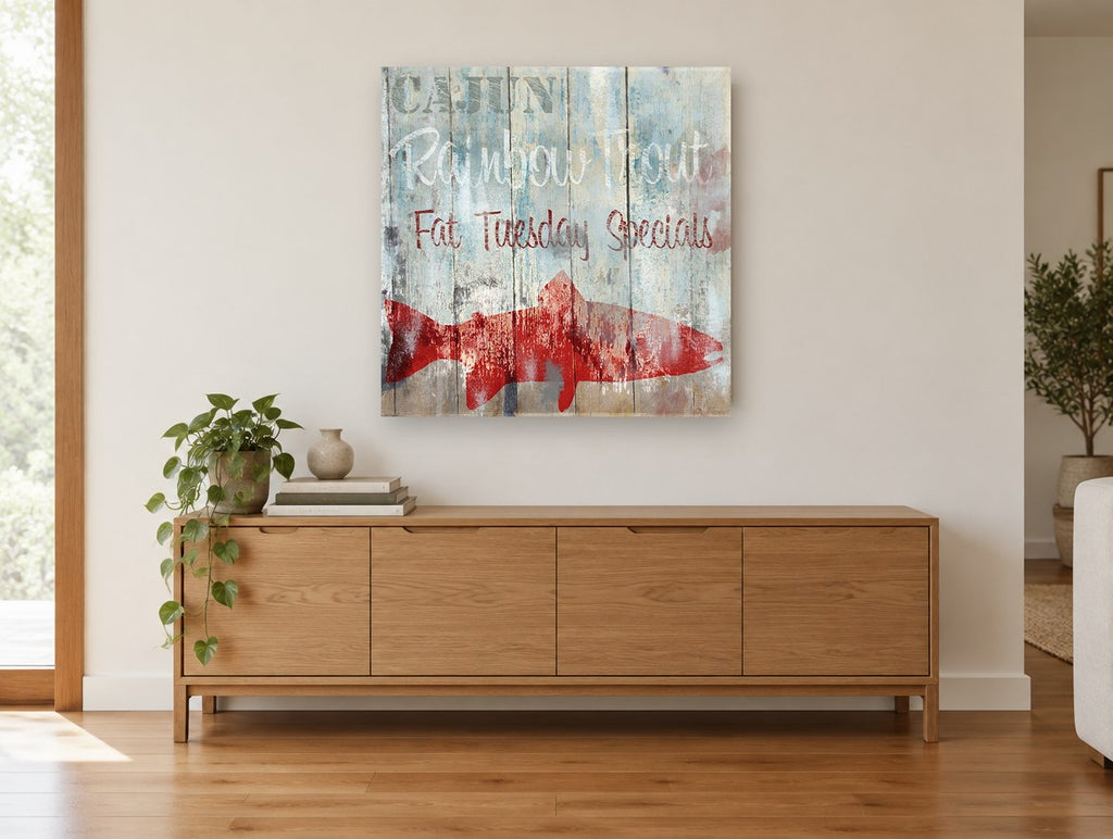 Cajun Trout Signboard coastal canvas print on the wall of a living room above a sideboard