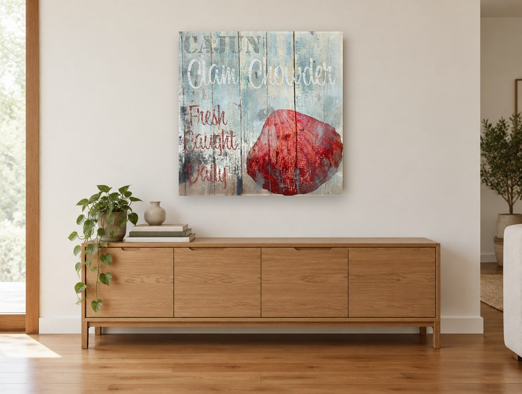 Cajun Clam Chowder Sign coastal canvas print on the wall of a living room above a sideboard