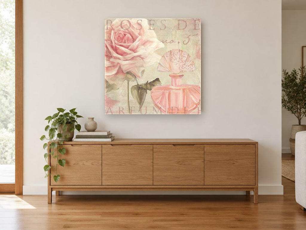 Blush Rose Perfume floral canvas print on the wall of a living room above a sideboard