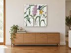 Lilac and Spiderwort Meadow floral canvas print on the wall of a living room above a sideboard
