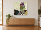 Patchwork Brocade Butterfly floral canvas print on the wall of a living room above a sideboard