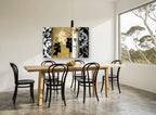 Gilded Orchid Panels floral canvas print on the wall of a dining room