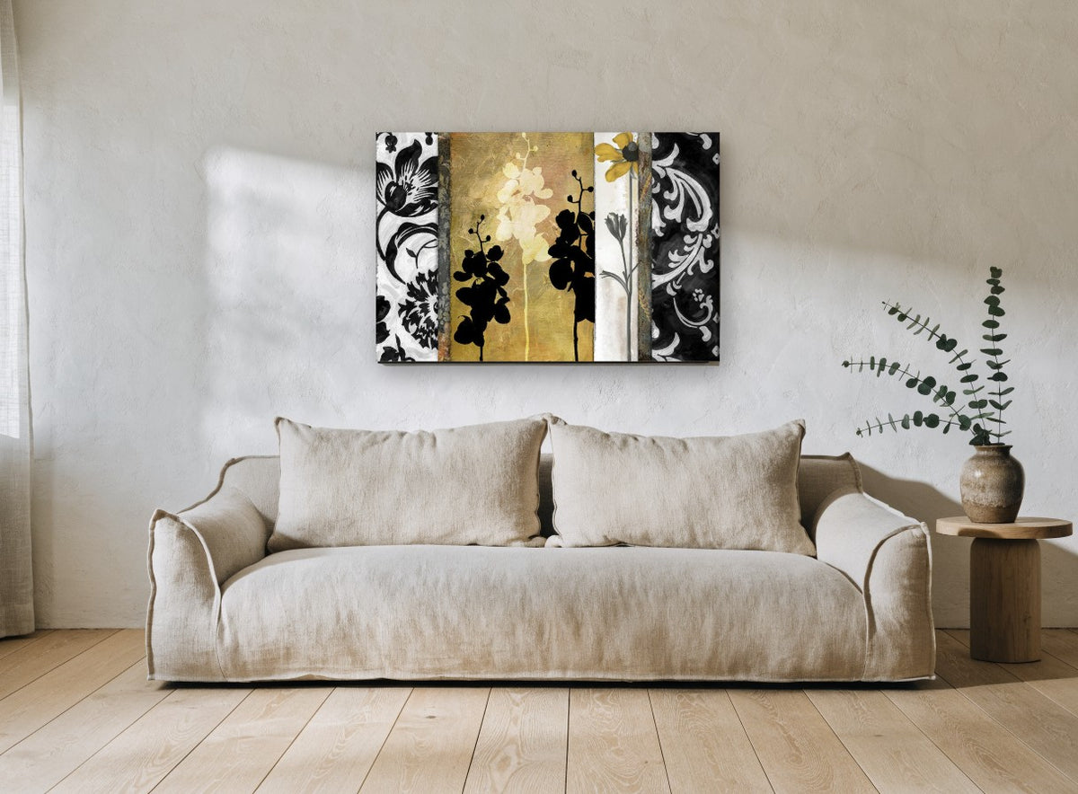 Gilded Orchid Panels floral canvas print on the wall of a living room