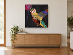 Patchwork Hummingbird floral canvas print on the wall of a living room above a sideboard